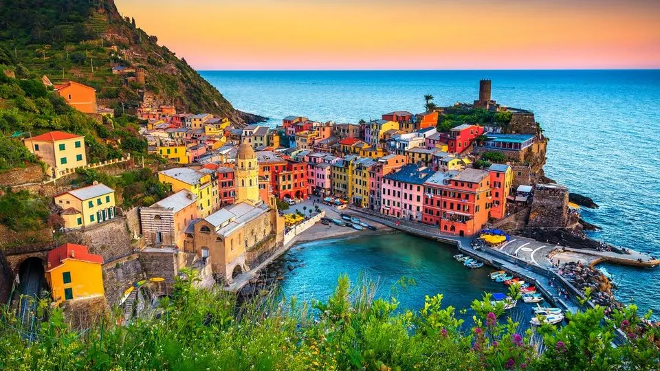 Majestic touristic village on the hill with colorful mediterranean buildings.