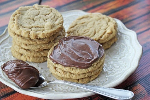 Nutella frosted peanut butter cookies