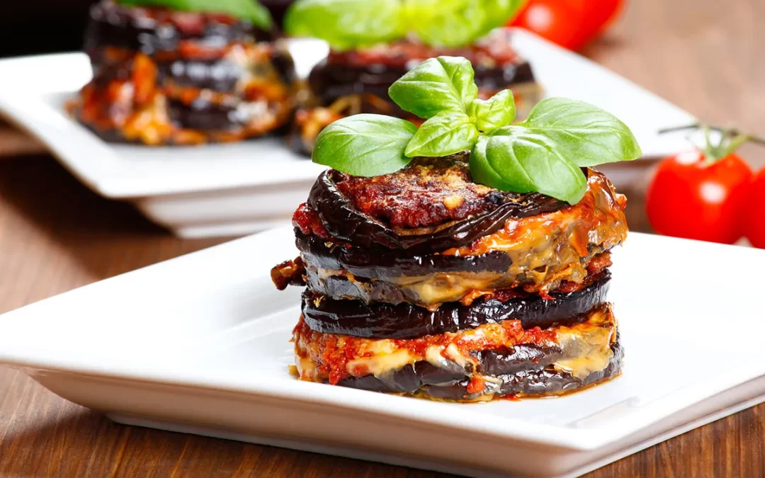 A close-up of a slice of Parmigiana di Melanzane